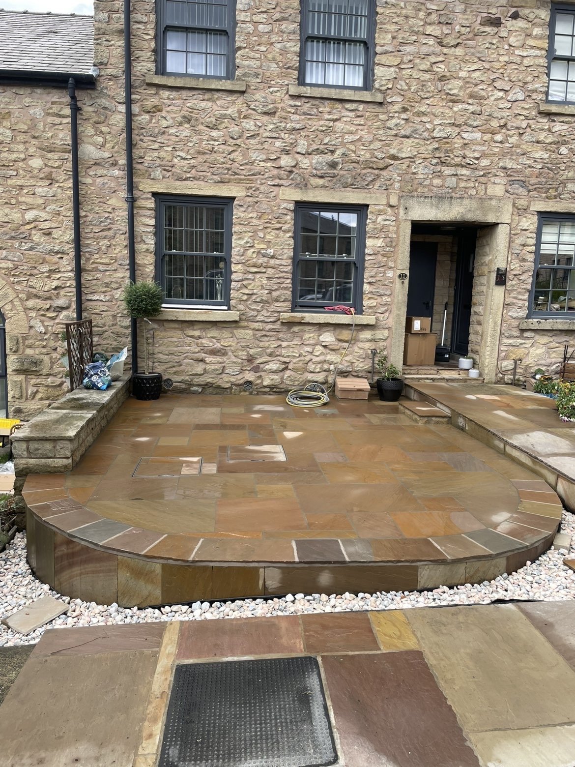 Finished circular sandstone patio